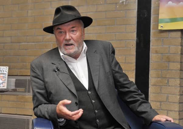 George Galloway, politician, broadcaster, writer, pictured in Pilots Row Centre on Wednesday evening last, during his wide ranging conversation with Raymond McCartney MLA, as part of the Gasyard Feile. DER3217GS074
