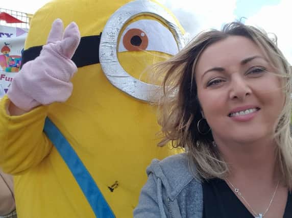 Thumbs up! Mullan meets a Minion at a festival in Derry this summer.