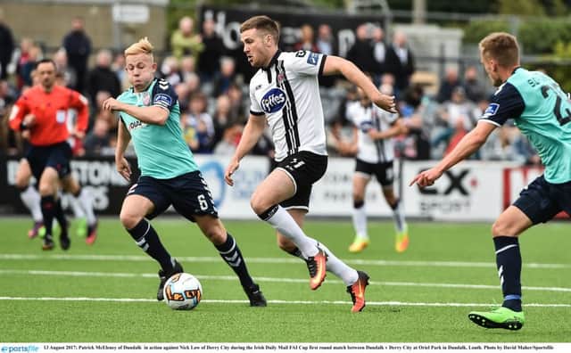 The impressive Patrick McEleney of Dundalk  in action against Nick Low of Derry City during the Irish Daily Mail FAI Cup first round match.
