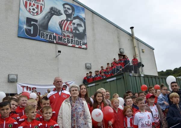 Members of the McBride family, friends and Derry City footballers pictured at the unveiling of a mural, at Long Tower Youth Club on Monday last, commemorating the former Derry City captain Ryan McBride. DER3317GS021