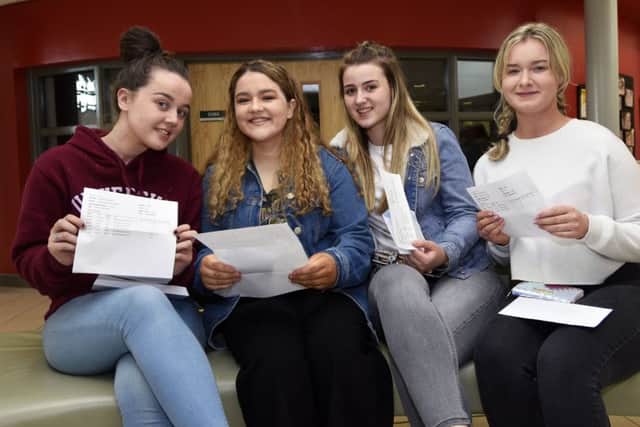 Pictured after collecting their 'A' Level results at St. Cecilia's College were, from left, Nicola Doherty, Emma Hutton, Shannon Donnelly and Roisin Liddey. DER3217-112KM