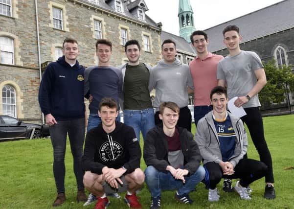Pictured after collecting their 'A' Level results at Lumen Christi College were from left, front row, Fintan Stewart, Mark Desmond and Luke McCarron, back row, Michael McColgan, Stephen McKeever, Kielan Gillespie, Oisin McLaughlin, Eoin Matthewson and Michael Philson. DER3217-104KM