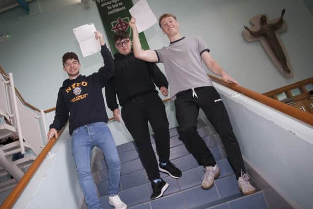 BOYS DO WELL!. . . .St. JosephÃ¢Â¬"s Boys School, Derry students Caoimhin OÃ¢Â¬"Doherty, Conor OÃ¢Â¬"Reilly and Rhys McGaghey celebrate their A Level results yesterday.