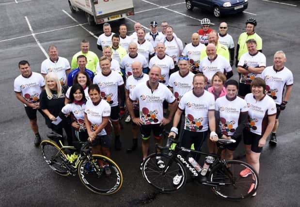 Cyclists pictured before leaving from Da Vinici's Hotel on Friday at the start of a three day 200km cycle along the Wild Atlantic Way to raise fund for Children in Crossfire. Included is Eileen Warren of Children in Crossfire. DER3717-102KM