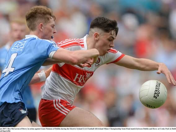 Ben McCarron of Derry in action against Liam Flatman of Dublin during the Electric Ireland GAA Football All-Ireland Minor Championship Semi-Final match between Dublin and Derry at Croke Park