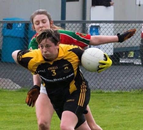 Derry Ladies defender, Catherine Fletcher playing for her club, St Eunan's.