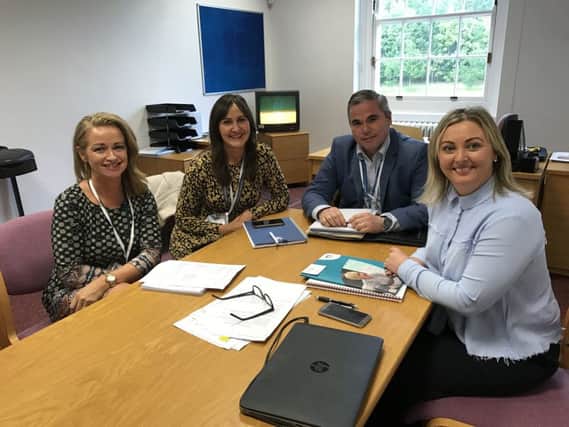 Sinn FÃ©in Foyle MLA Karen Mullan meeting in Stormont with representatives from the Executive Office & Urban Villages for an update on the regeneration of Meenan Square complex.