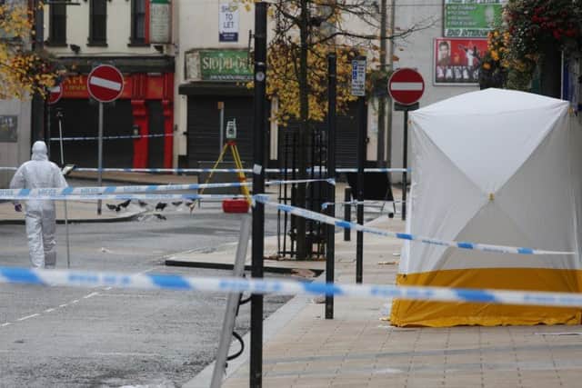 A forensic officer at the exact spot in William Street where Jordan McConomy was fatally assaulted on Sunday. (Photo: Presseye)