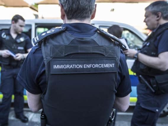 The immigration offenders were found to be working in a takeaway in Derry city centre.