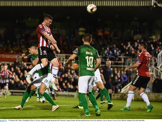 Derry City's Harry Monaghan heads narrowly over the crossbar in the first half of the Candy Stripes' clash with champions Cork City at Turner's Cross.