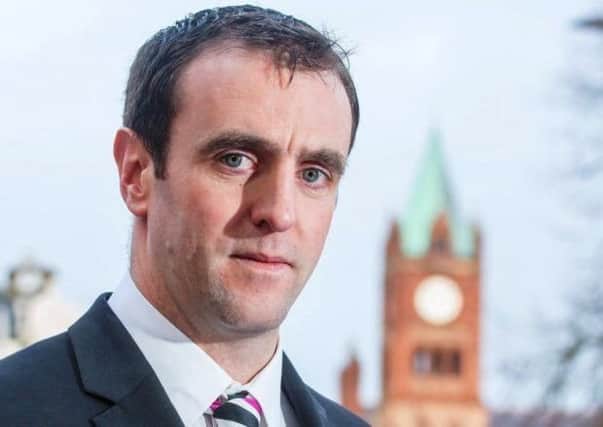 Mark H Durkan.
