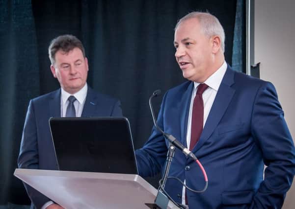 Derry City & Strabane Council's CEO John Kelpie addresses this week's investment conference in Boston as Seamus Neely, CEO of Donegal County Council, looks on.