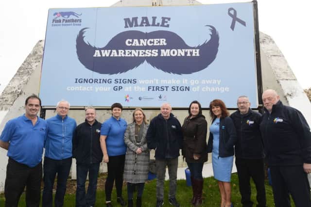 Staff, board members and volunteers pictured at the launch of the Male Cancer Awareness Month billboard at Free Derry Corner by the Pink Panthers Support Group, from left, Danny McNamee, Sean Collins, CRT, Martin Mullan, Maureen Collins, Development Worker, Karen Mullan, Charlie Nash, Julie McGinty, Margaret Cunningham, John Nash, Co-chair, and Wliie McGaughey. DER4417-131KM
