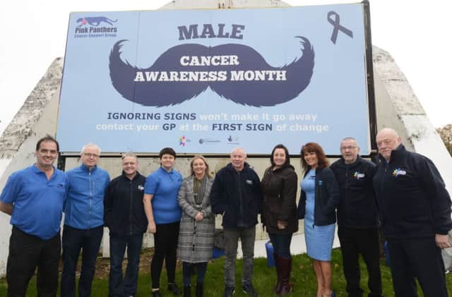 Staff, board members and volunteers pictured at the launch of the Male Cancer Awareness Month billboard at Free Derry Corner by the Pink Panthers Support Group, from left, Danny McNamee, Sean Collins, CRT, Martin Mullan, Maureen Collins, Development Worker, Karen Mullan, Charlie Nash, Julie McGinty, Margaret Cunningham, John Nash, Co-chair, and Wliie McGaughey. DER4417-131KM