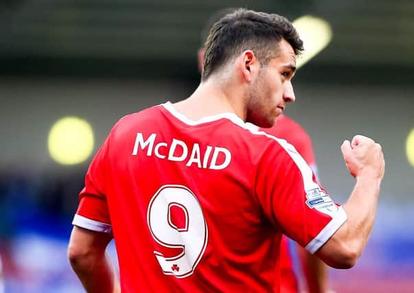 Former Cliftonville and Derry City striker, David McDaid has hit back at Linfield boss, David Healy who questioned his ambition.