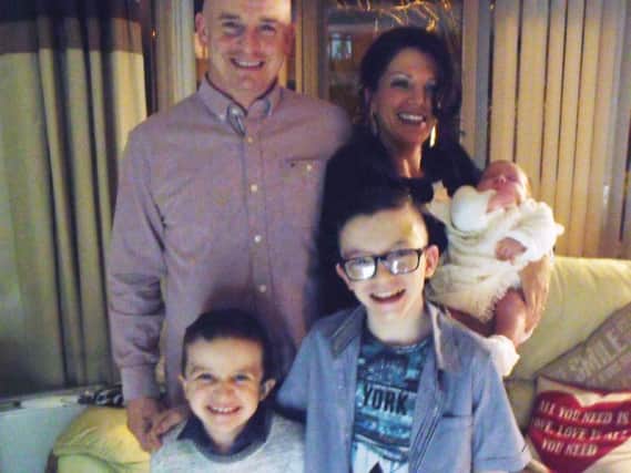 Sean McGrotty, with his partner Louise holding their baby, four-month-old Rionaghac-Ann, and his sons Mark, 12, (right) and Evan, eight. Sean and his sons died along with his mother-in-law Ruth Daniels, 57, and her 14-year-old daughter Jodie Lee Daniels after their SUV sank after sliding off a pier slipway in Buncrana, Co Donegal.